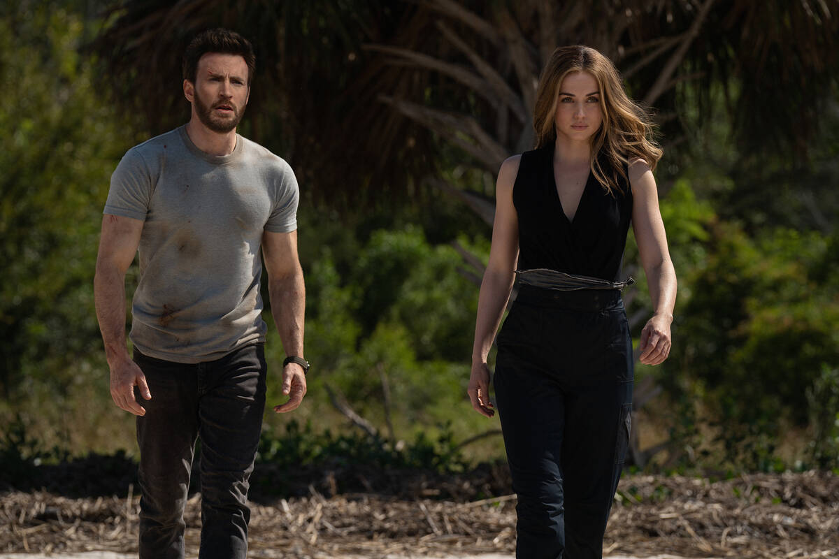 Chris Evans and Ana de Armas in "Ghosted," premiering this weekend on Apple TV+. (App ...