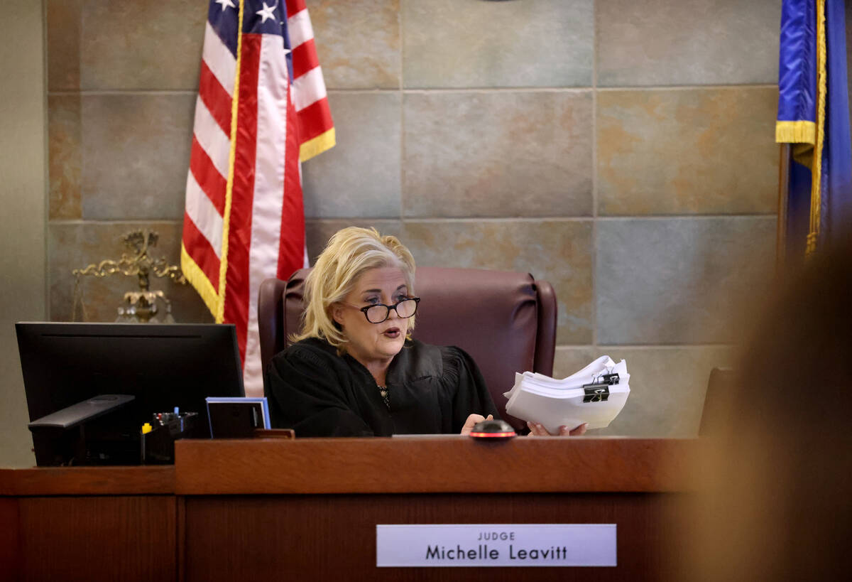 Clark County District Court Judge Michelle Leavitt speaks to former Clark County Public Adminis ...