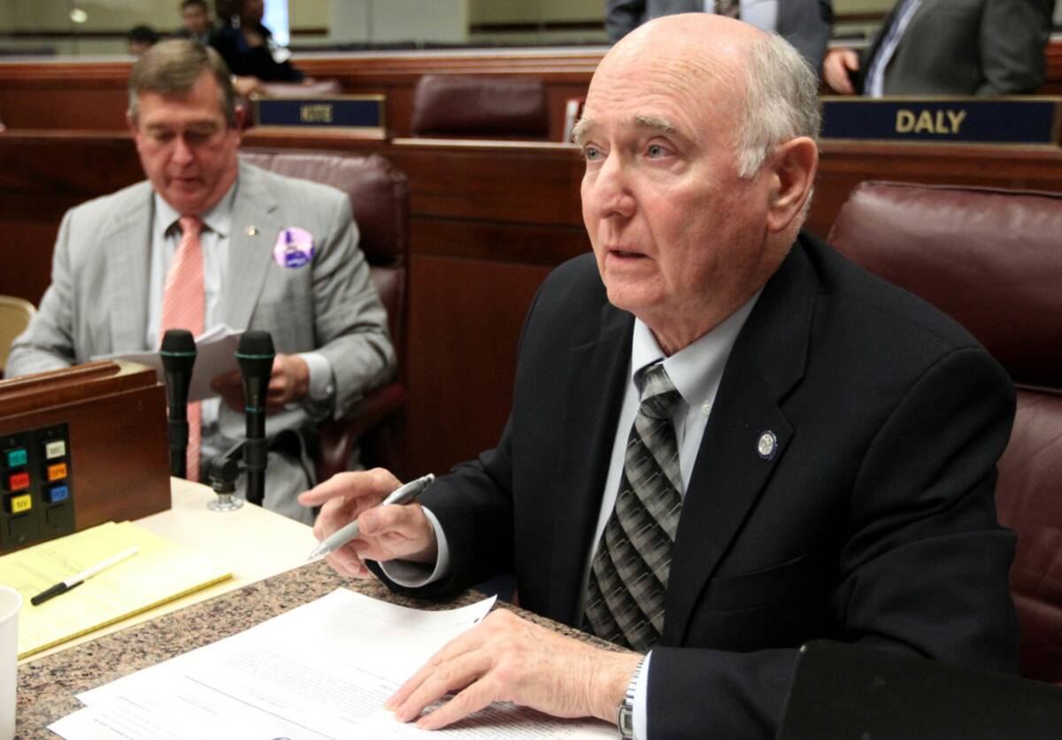Nevada Assemblyman Paul Aizley, D-Las Vegas, talks from his desk on the Assembly floor in 2011 ...