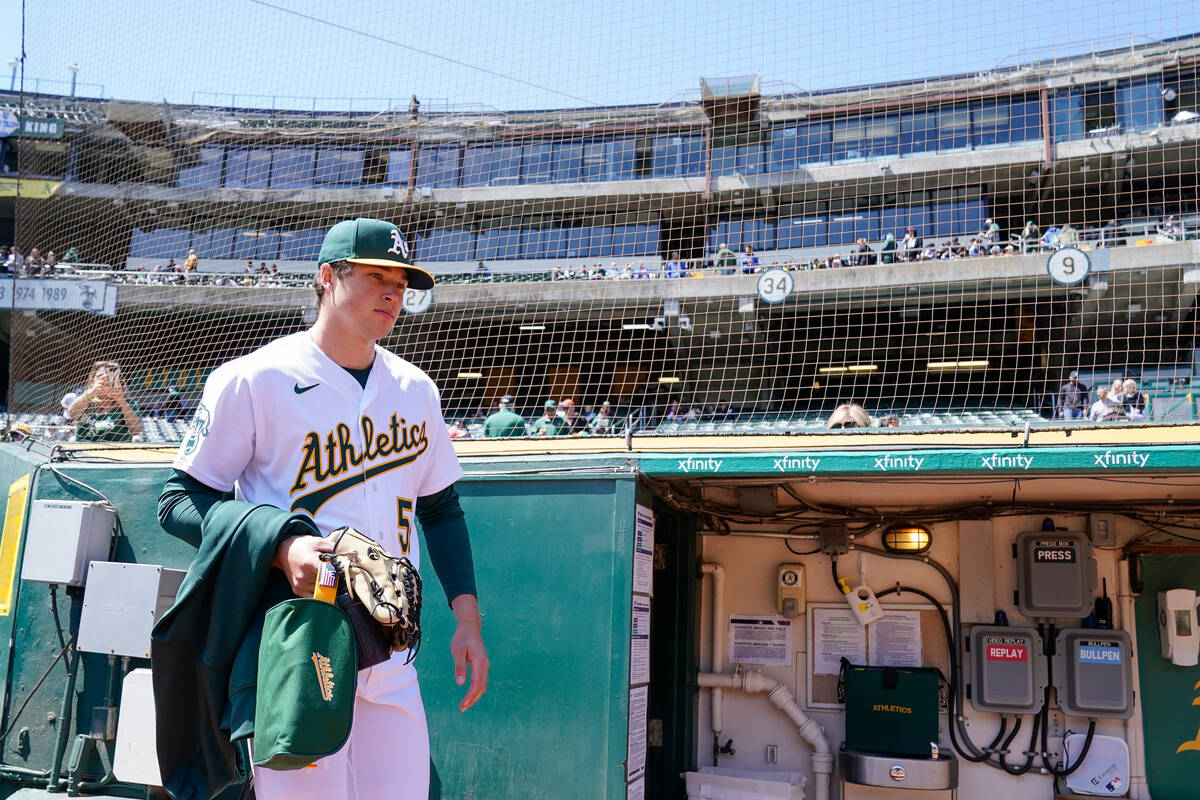 Oakland Athletics pitcher Mason Miller takes the field to warm up before a baseball game agains ...