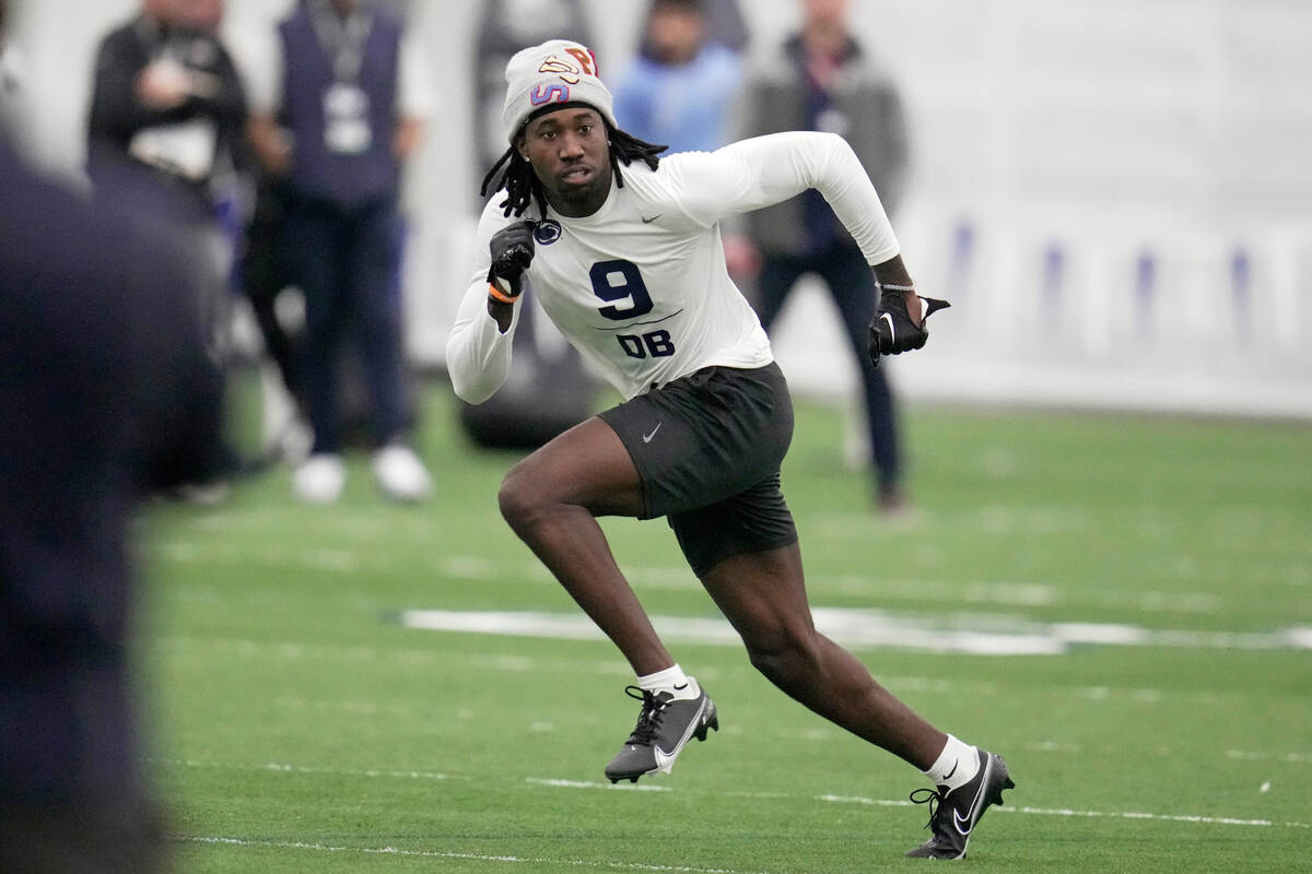 Defensive back Joey Porter Jr. runs a drill during Penn State's football pro day, in State Coll ...