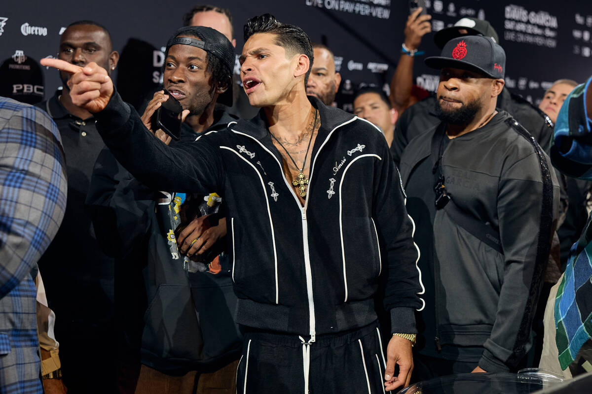 Ryan Garcia points at Gervonta Davis following the staredown that concluded their final promoti ...