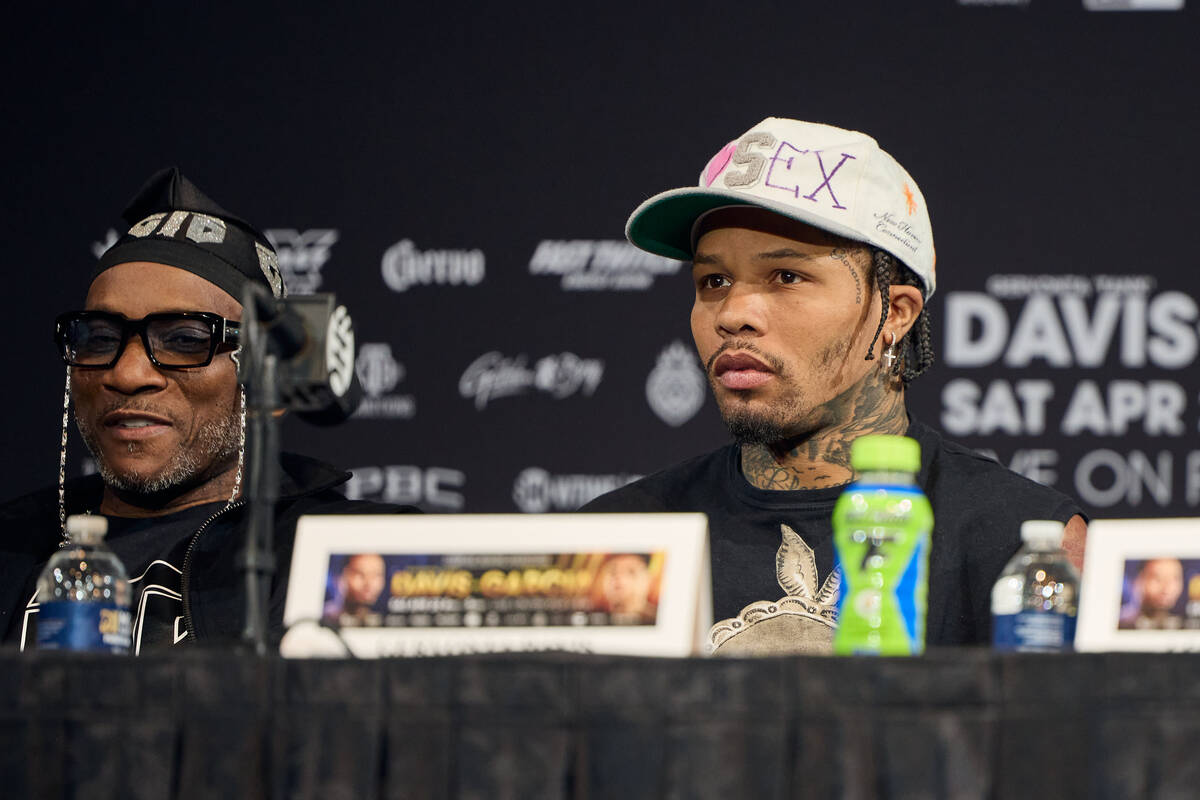 Gervonta Davis (right) sits beside trainer Calvin Ford during the final promotional press confe ...