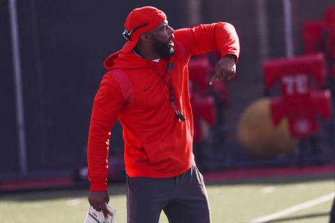 UNLV Rebels defensive coordinator Keith Heyward motions to his players during the first day of ...