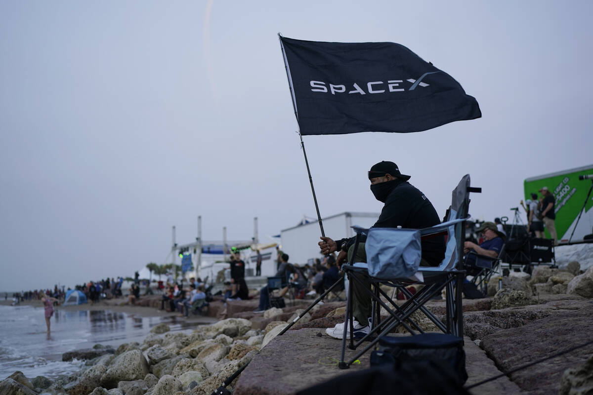 Jose Cabrera, a technician with SpaceX, waits as the SpaceX Starship, the world's biggest and m ...