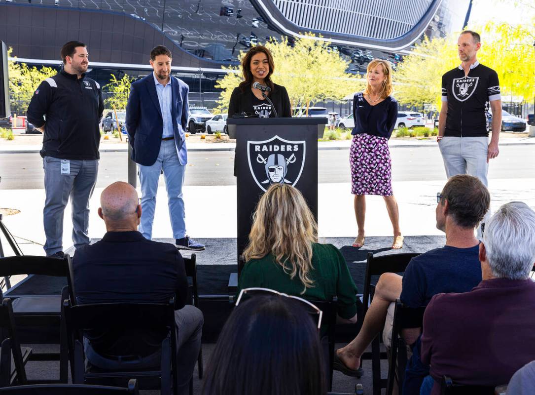 Raiders President Sandra Douglass Morgan, speaks, as Chris Sotiropulos, VP stadium operations, ...