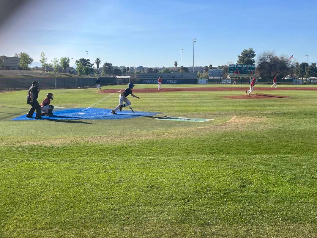 Green Valley's Brady Ballinger runs to first base in the bottom of the sixth in the Gators' 9-7 ...