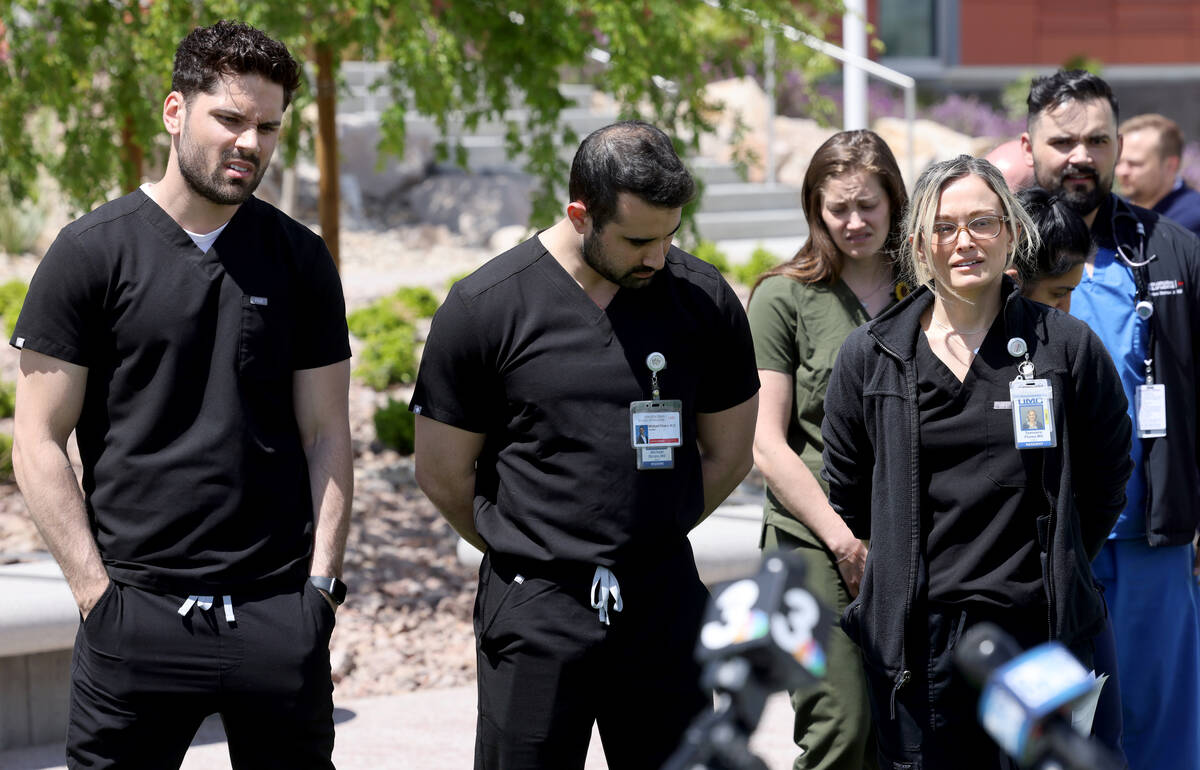 Colleagues of slain Dr. Gwen Amsrala, from left, Dr. Omar Sanyurah, Dr. Michael DiCaro and Dr. ...