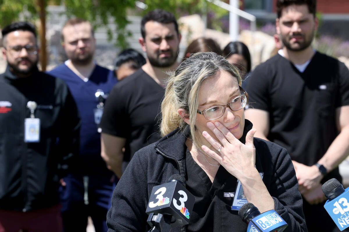 Dr. Tammera Flores, a colleague of slain Dr. Gwen Amsrala, speaks during a news conference at t ...