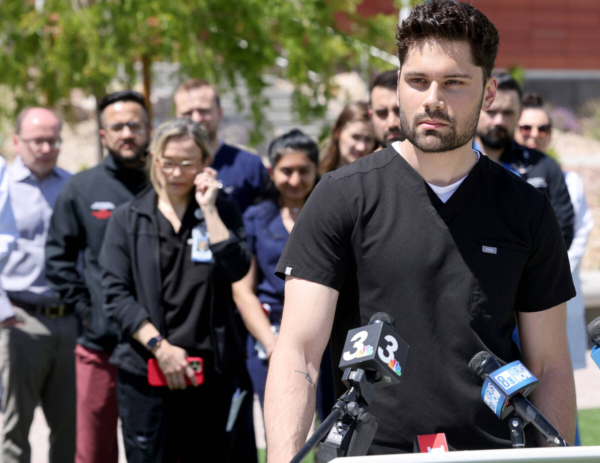 Dr. Omar Sanyurah, a colleague of slain Dr. Gwen Amsrala, speaks during a news conference at th ...