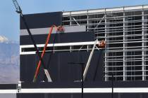 Workers are seen at the Raiders' under-construction practice facility in Henderson on Monday, F ...