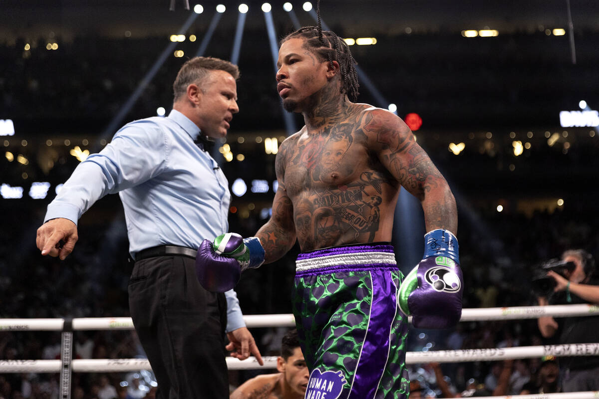 Gervonta Davis walks off after knocking down Ryan Garcia during a catchweight boxing bout at T- ...
