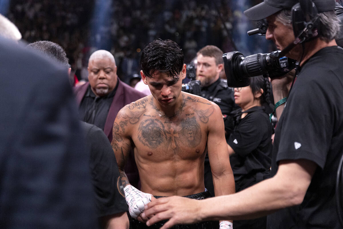 Ryan Garcia reacts after losing his catchweight boxing bout to Gervonta Davis at T-Mobile Arena ...