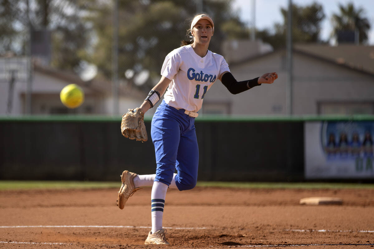 Green Valley’s Avari Morris pitches to Faith Lutheran during a high school softball game ...