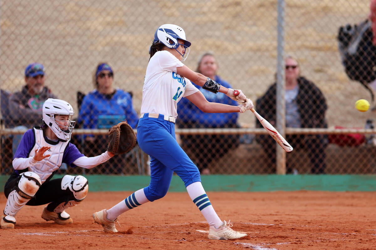 Green Valley's Avari Morris (11) connects with the ball for a hit during a softball game agains ...