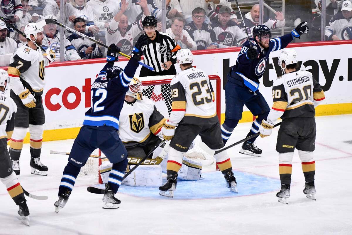 Winnipeg Jets' Pierre-Luc Dubois (80) celebrates his goal against Vegas Golden Knights goaltend ...