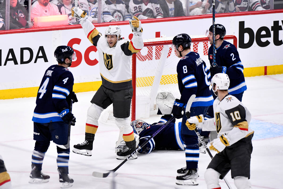 Vegas Golden Knights' William Karlsson (71) celebrates after his goal against Winnipeg Jets' go ...