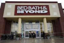 Shoppers enter and exit a Bed Bath & Beyond in Schaumburg, Ill., Jan. 14, 2021. (AP Photo/Nam Y ...