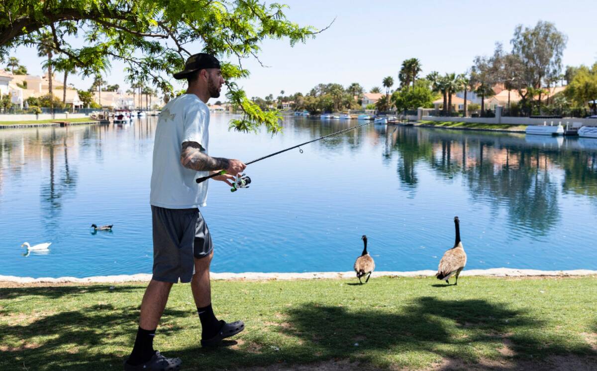 William Fernandez prepares to fish at Desert Shores, on Monday April. 24, 2023, in Las Vegas. ( ...