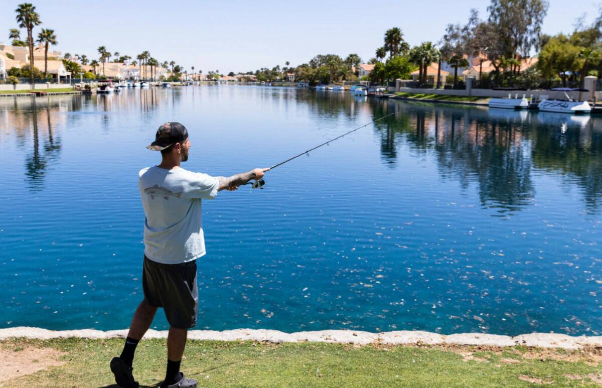 William Fernandez casts his fishing rod at Desert Shores, on Monday April. 24, 2023, in Las Veg ...