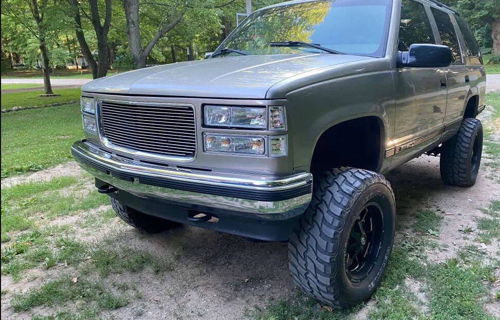 A man, woman and a 6-year-old child were in a tan or gold 2000 Chevy Yukon with Nevada license ...