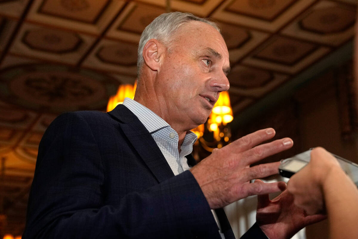 Major League Baseball Commissioner Rob Manfred speaks with the news media after a meeting of ML ...