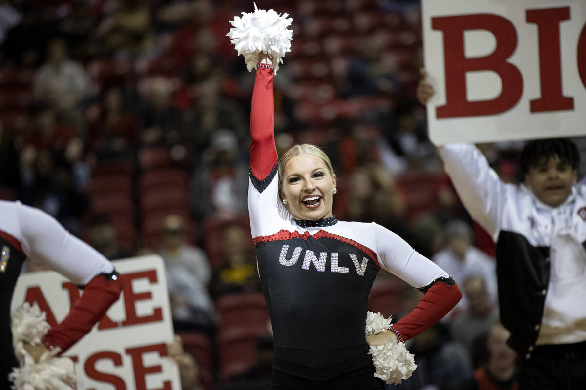 Fifth-year senior Alya Kretchman performs with Rebel Girls & Company during a timeout of a UNLV ...