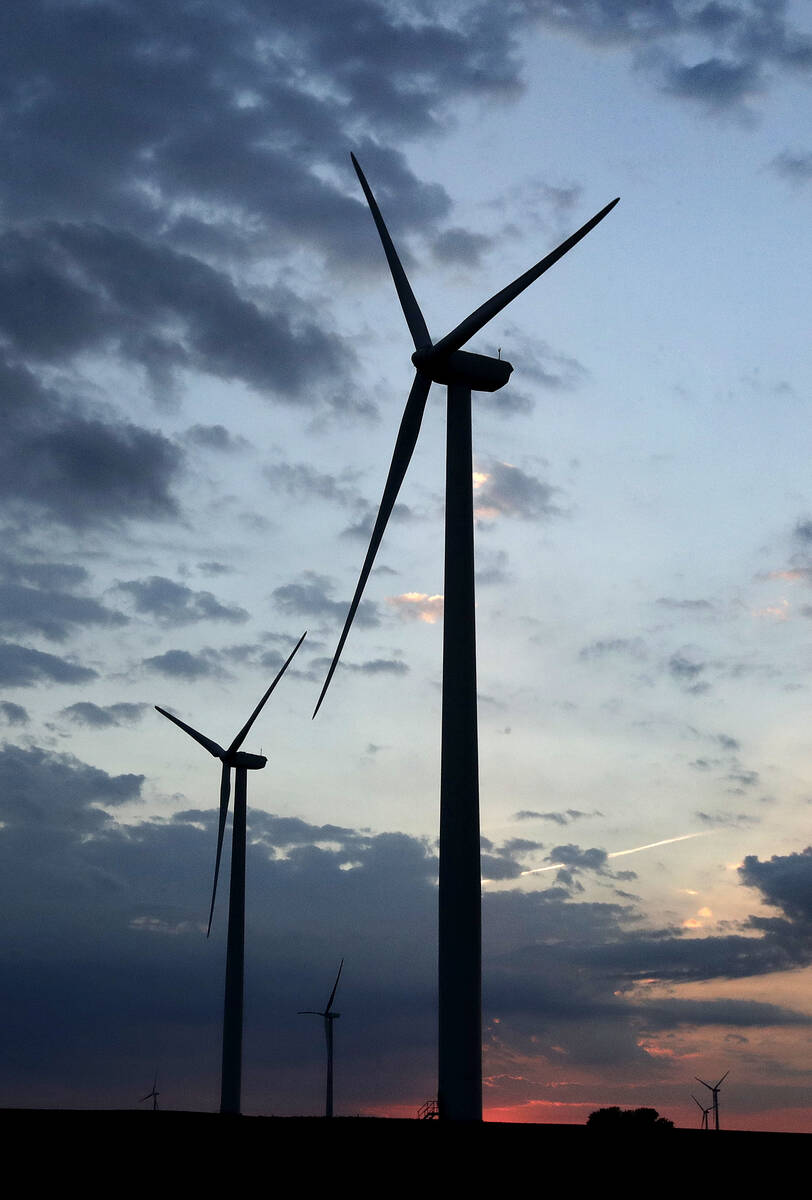 FILE - In this June 1, 2017 file photo, wind turbines, which are part of the Lost Creek Wind Fa ...