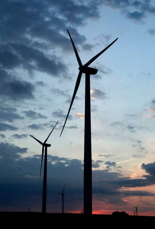 FILE - In this June 1, 2017 file photo, wind turbines, which are part of the Lost Creek Wind Fa ...