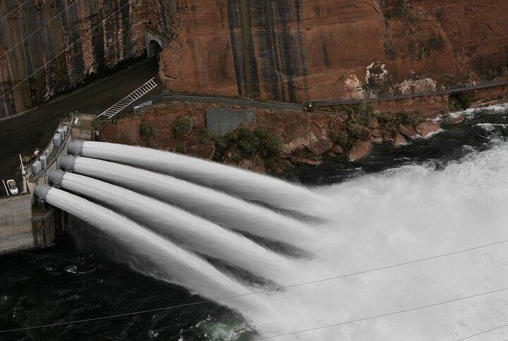 Water is released from Glen Canyon Dam near Page, Arizona in 2004. (AP Photo/Laura Rauch)