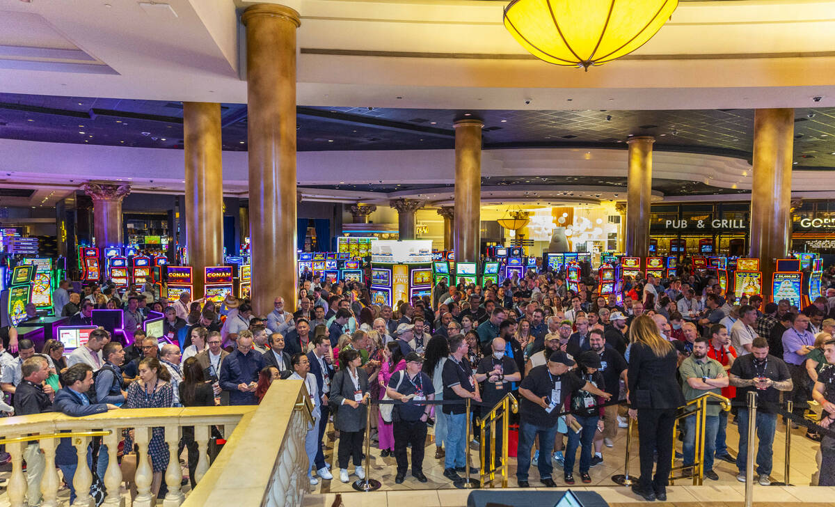 Attendees line up for a screening of The Flash during CinemaCon at Caesars on Tuesday, April 25 ...