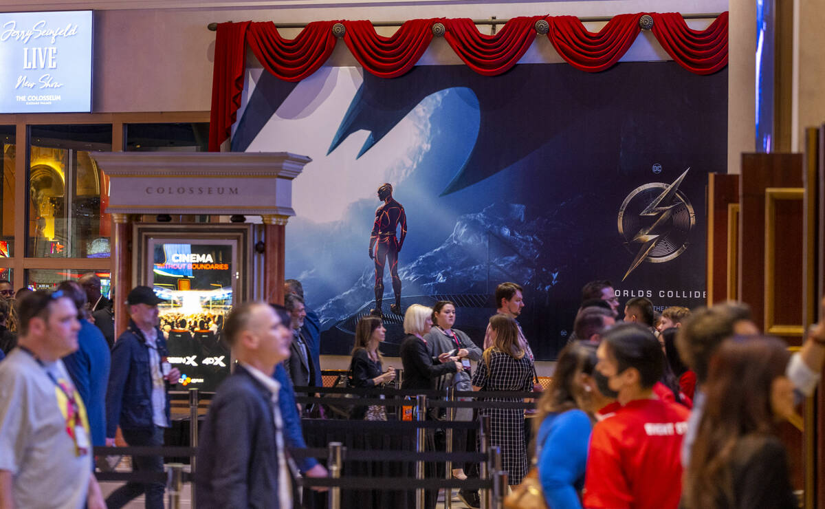 Attendees stream in for a screening of The Flash during CinemaCon at Caesars on Tuesday, April ...