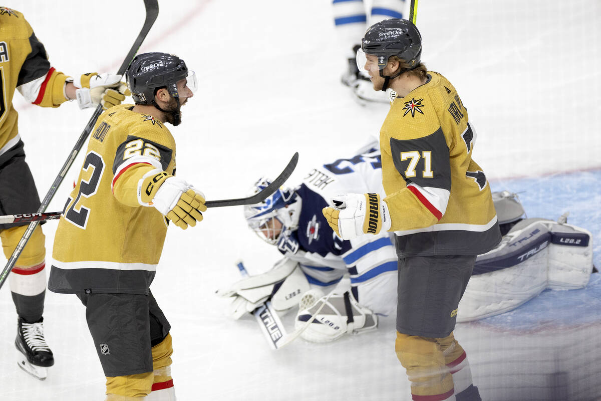 Golden Knights right wing Michael Amadio (22) and center William Karlsson (71) celebrate after ...