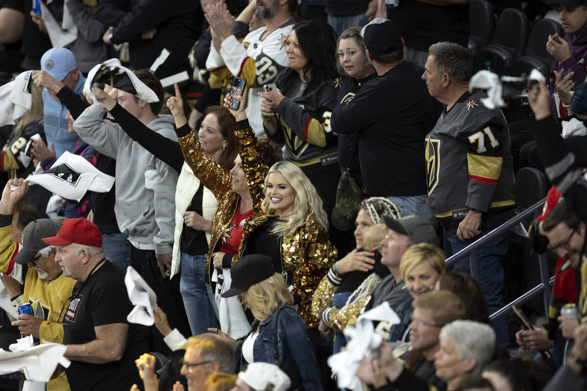 Golden Knights fans cheer for their team during the second period in Game 5 of an NHL hockey St ...