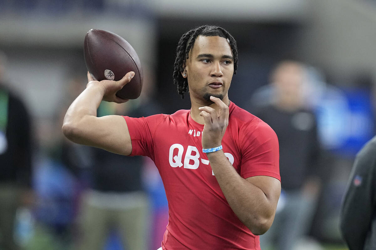 Ohio State quarterback CJ Stroud runs a drill at the NFL football scouting combine in Indianapo ...