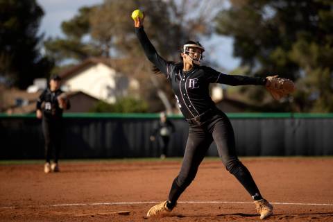 Faith Lutheran’s Ava Walker pitches to Green Valley during a high school softball game a ...