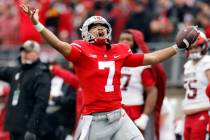 Ohio State quarterback C.J. Stroud celebrates after a long run against Indiana during the secon ...