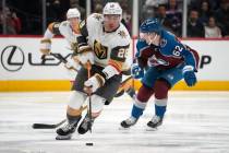 Golden Knights left wing William Carrier (28) drives down the ice with the puck as Colorado Ava ...