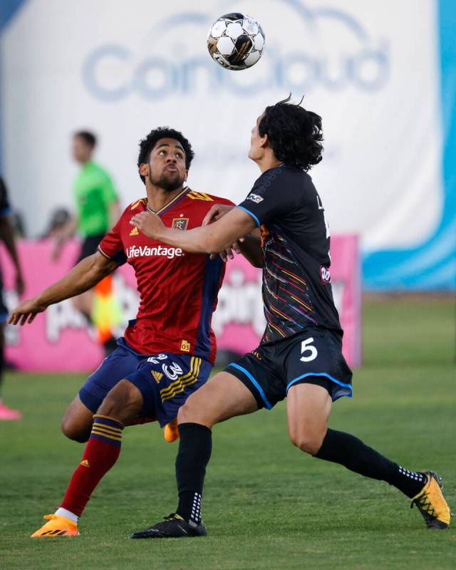 Real Salt Lake forward Ilijah Paul (23) and Las Vegas Lights FC defender Marcelo Lage (5) compe ...