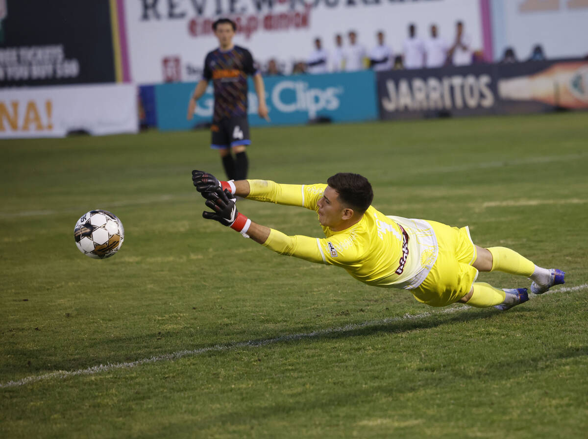Las Vegas Lights FC goalkeeper Leo Diaz (1) makes a diving save against Real Salt Lake during t ...