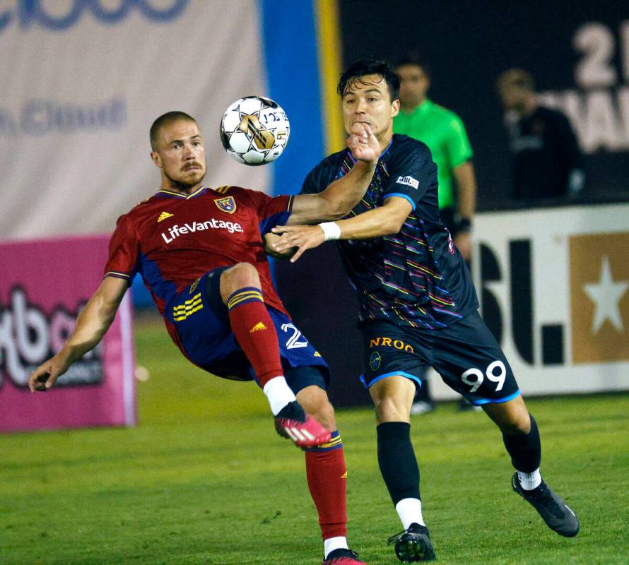 Real Salt Lake defender Erik Holt (20) and Las Vegas Lights FC forward Erick “Cubo&#x201 ...