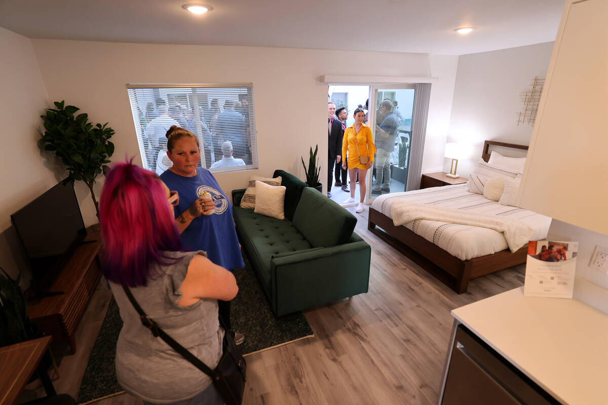Guests check out a model unit at shareDowntown East Fremont in Las Vegas Wednesday, April 26, 2 ...