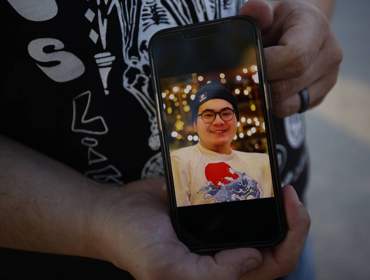 Jonathan Grace of Las Vegas, shows his brother Sonny Trushel’s photo at Red Ridge Park, ...