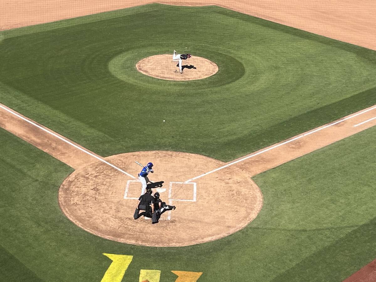 Faith Lutheran starting pitcher LJ Mercurius delivers a pitch during the second inning of the C ...