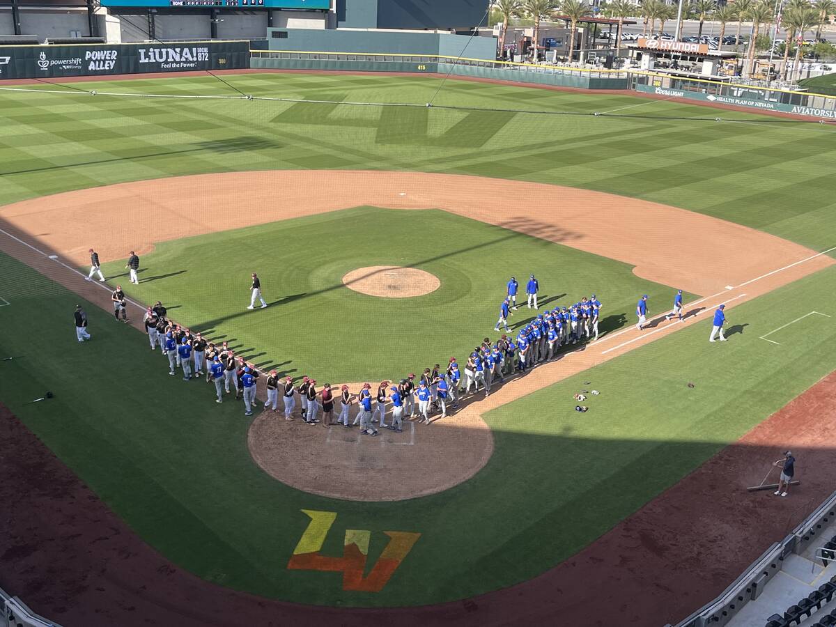 Bishop Gorman and Faith Lutheran shake hands following the Gaels' 4-2 win Thursday at Las Vegas ...