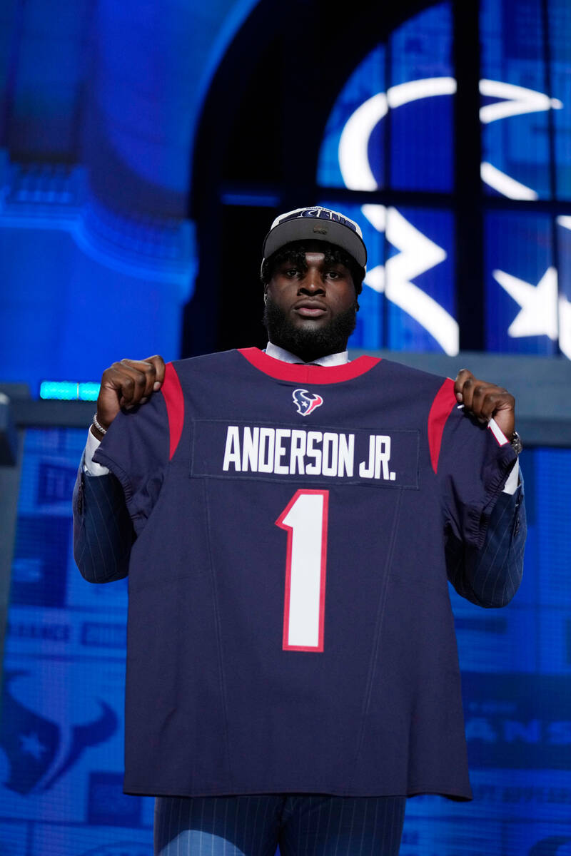 Alabama linebacker Will Anderson Jr. poses after being chosen by the Houston Texans with the th ...