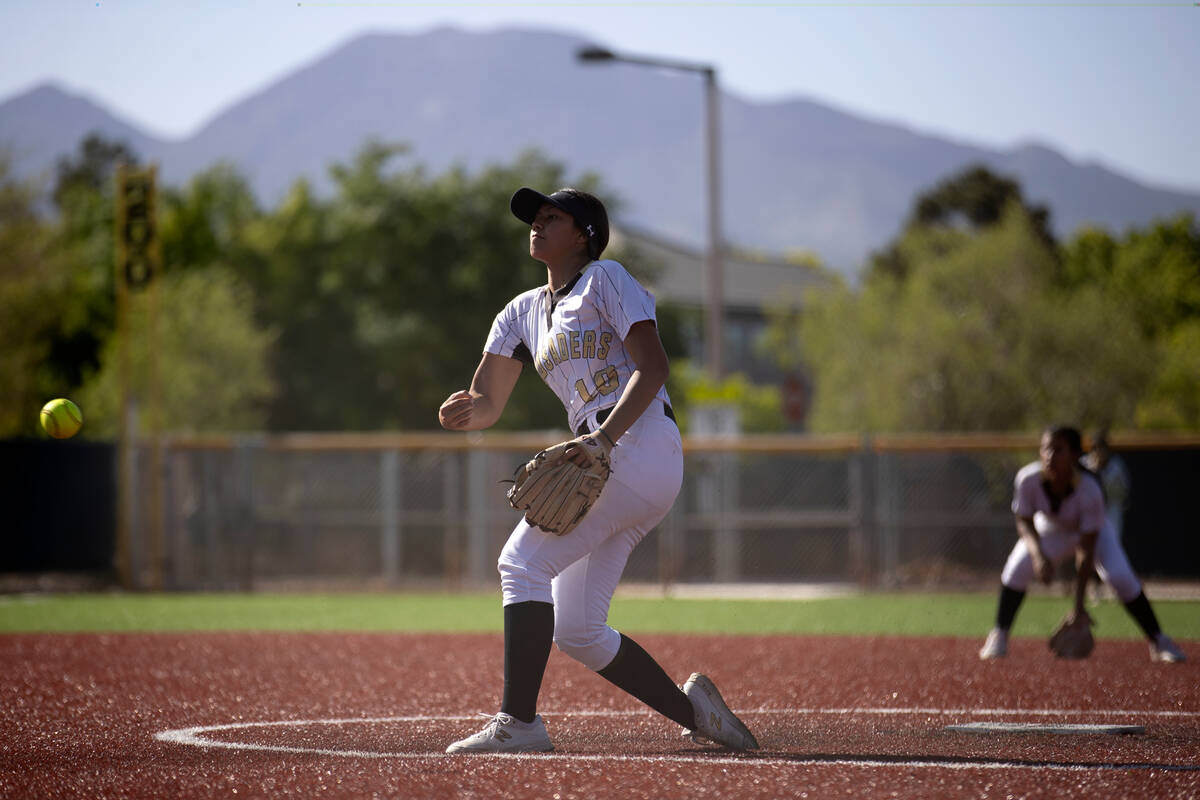 Faith Lutheran pitcher Tevaioali'i McKenzie throws to Green Valley during a high school softbal ...