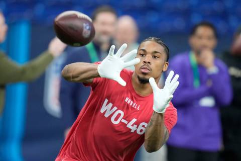 Tennessee wide receiver Cedric Tillman runs a drill at the NFL football scouting combine in Ind ...