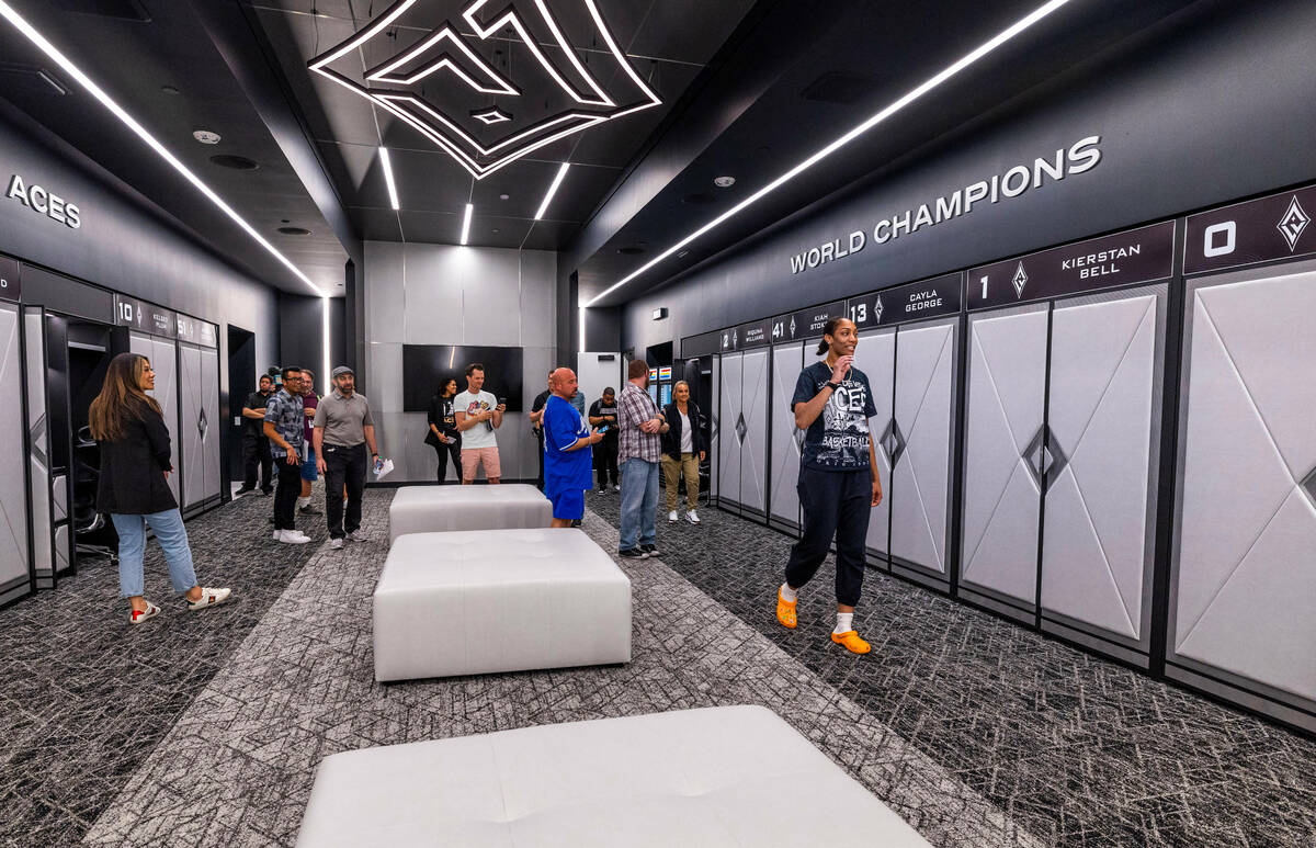 The Aces A'ja Wilson gives a tour of their new locker room at the practice facility within thei ...