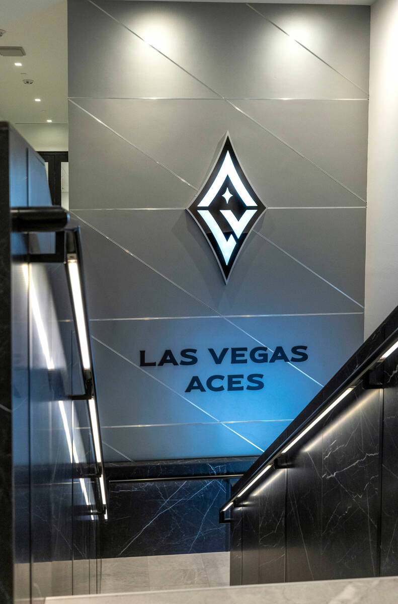 Aces log on the stairs to the second floor as they give a tour of their new practice facility w ...